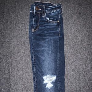 Distressed dark wash mid waist jeans